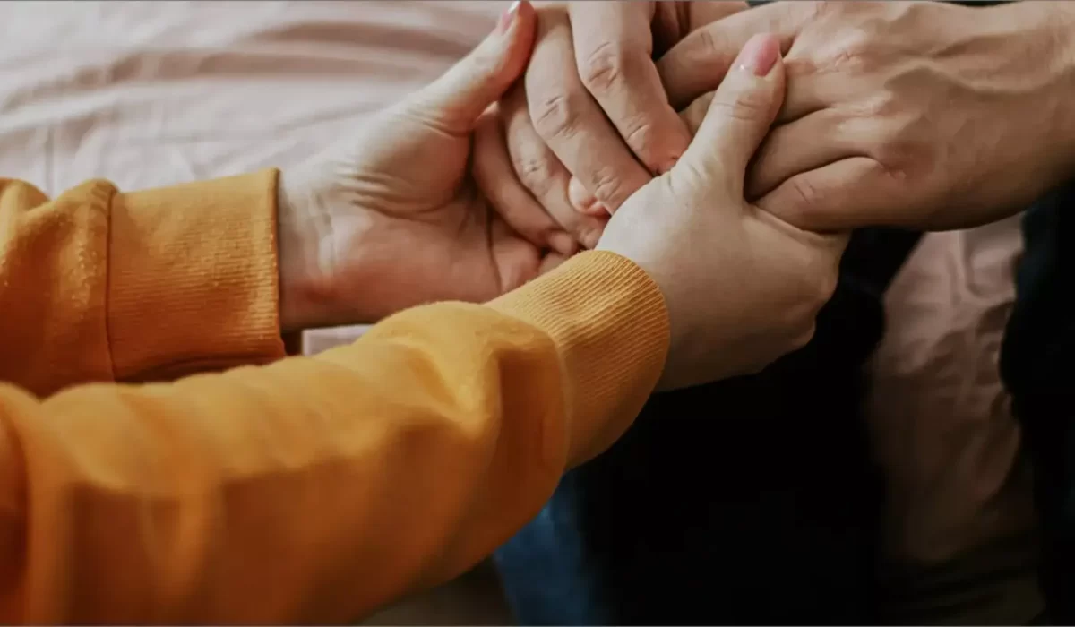 woman-holds-the-hands-of-elderly-father-help-and-2022-11-17-09-09-08-utc2-scaled.webp